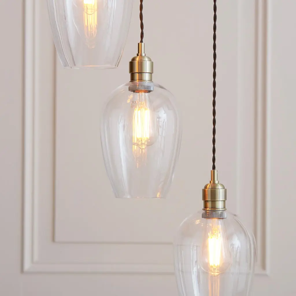 Millie Antique Brass 7 Light Pendant with Clear Glass Shades