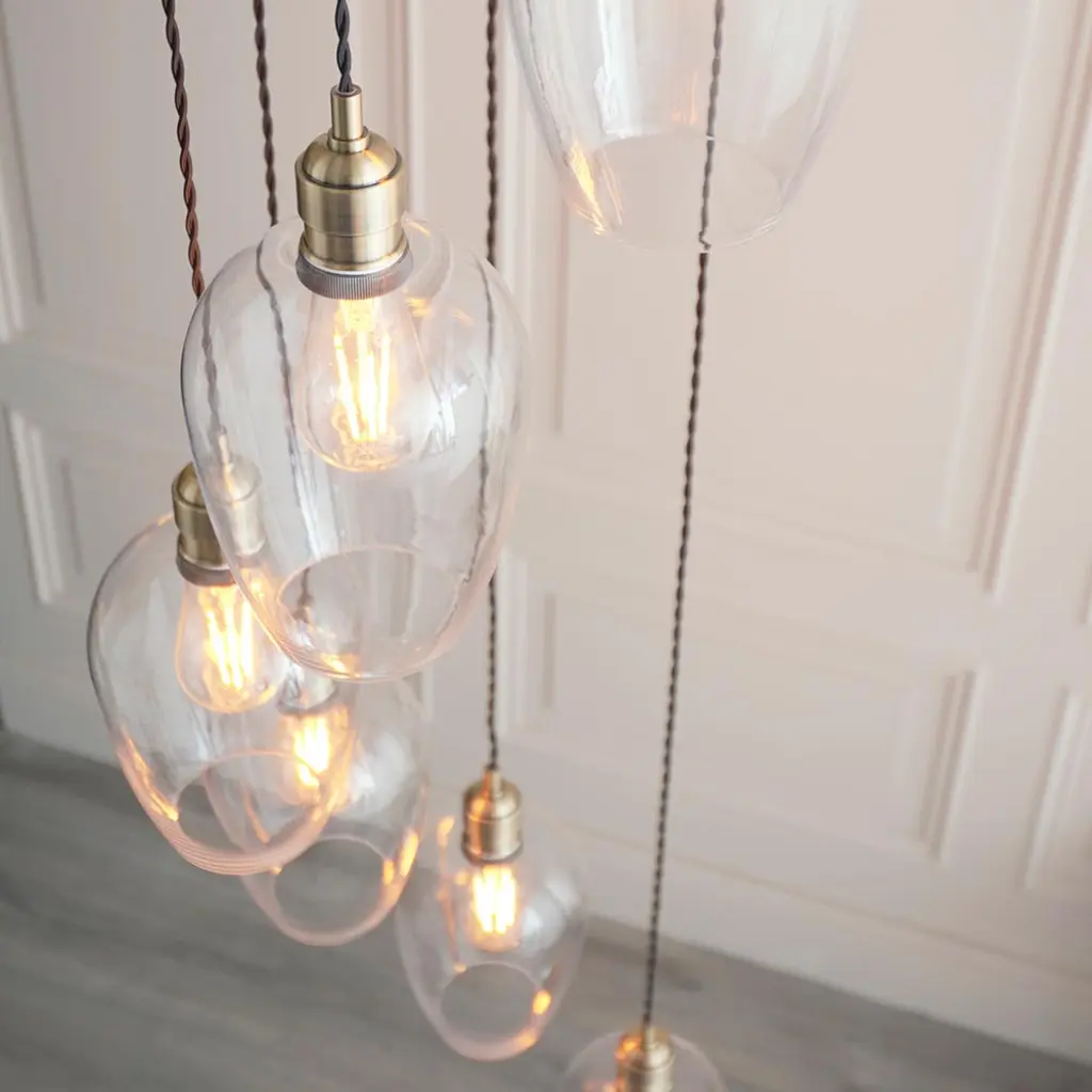 Millie Antique Brass 7 Light Pendant with Clear Glass Shades
