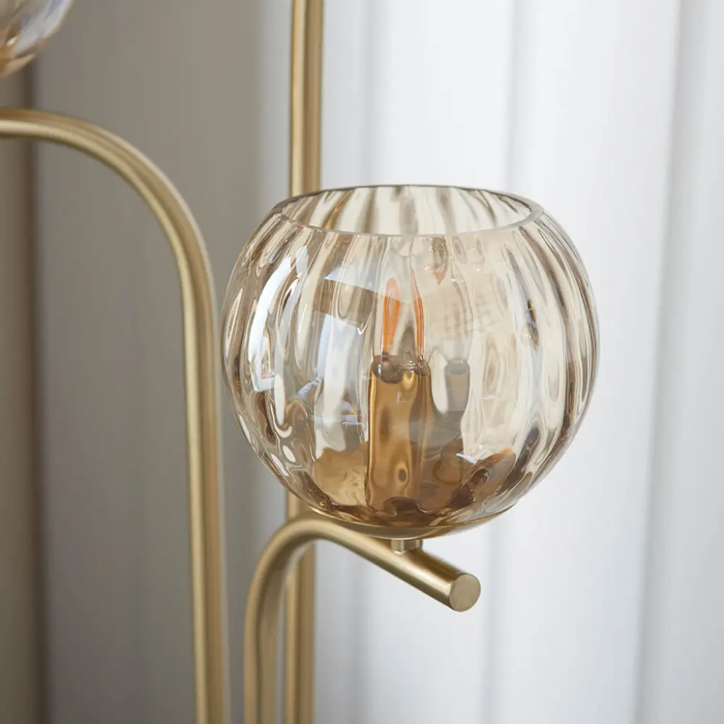 Dimple 3 Light Floor Lamp in Brushed Brass with Chapamgne Glass