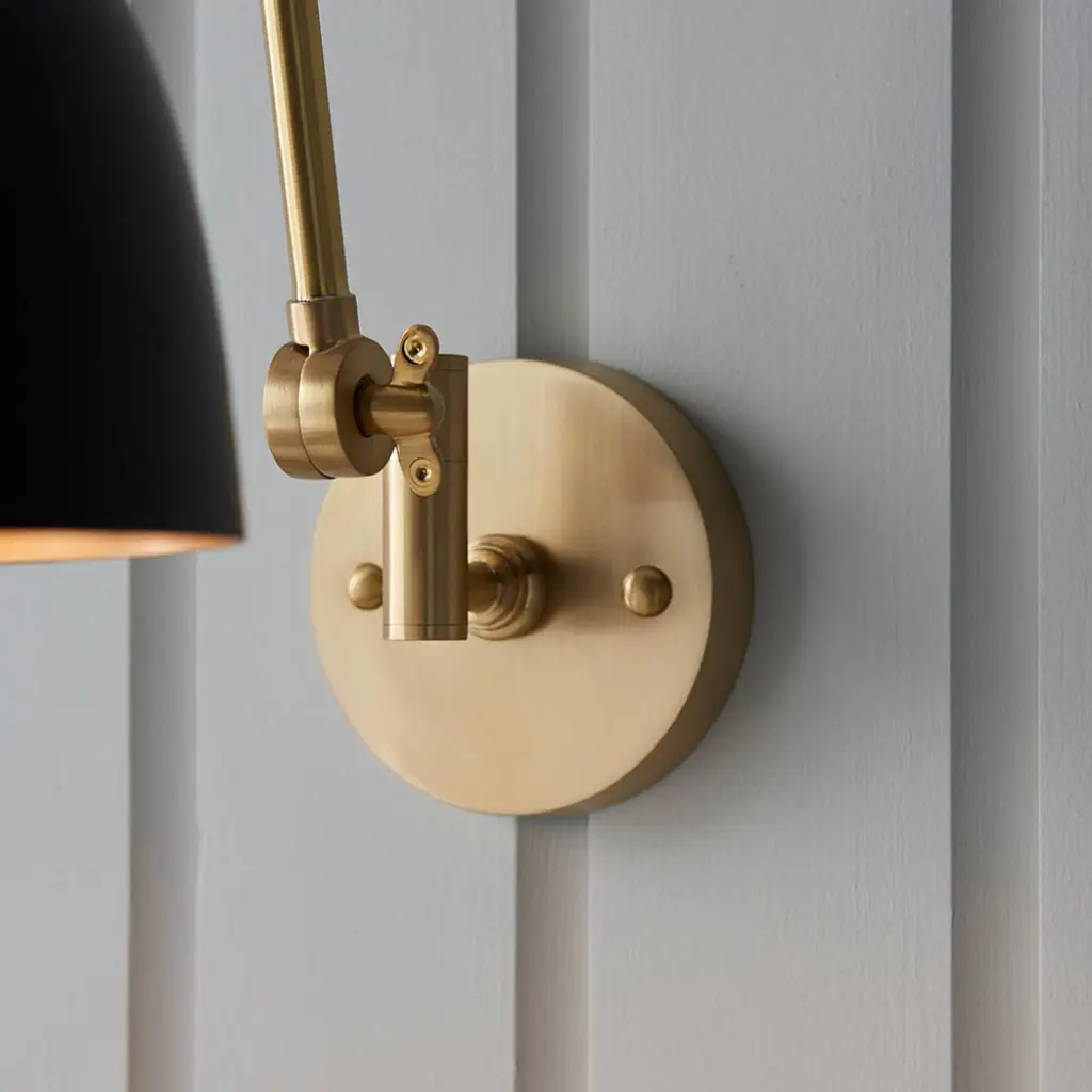 Lehal Swing Wall Light in Brass Finish