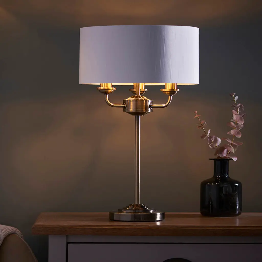 Highclere 3 Light Table Lamp in Antique Brass C/W White Shade