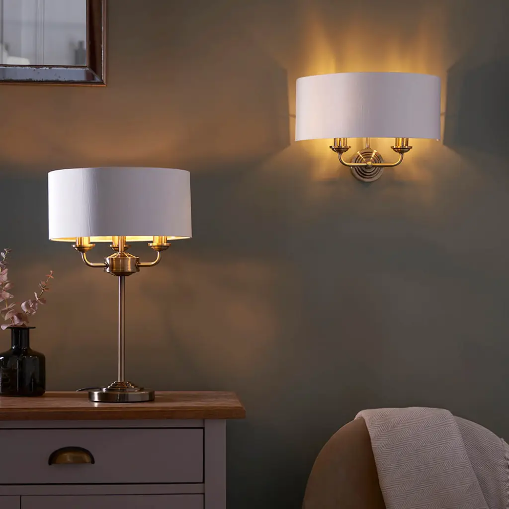 Highclere 3 Light Table Lamp in Antique Brass C/W White Shade