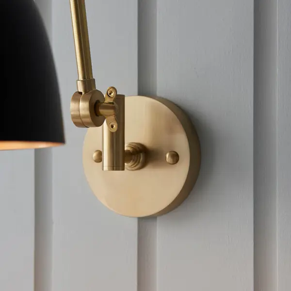 Lehal Swing Wall Light in Brass Finish