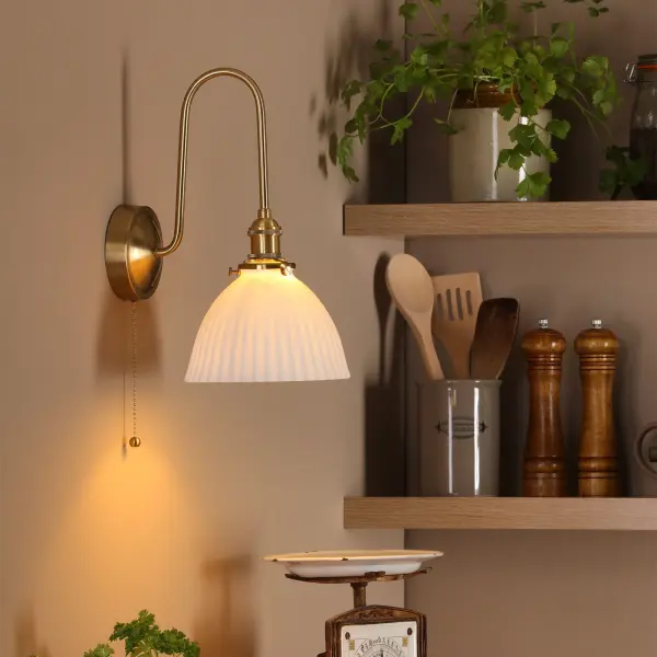 Hadano Brass Curved Arm Wall Light with Domed Shade