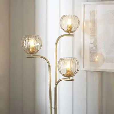 Dimple 3 Light Floor Lamp in Brushed Brass with Chapagne Glass