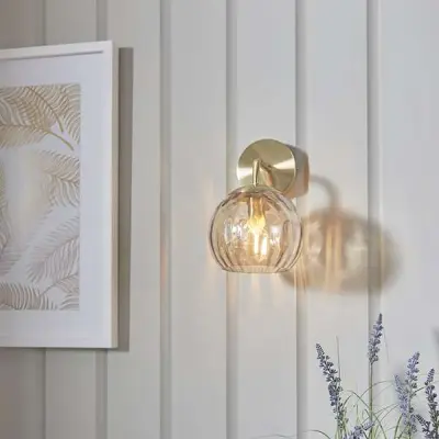 Dimple Wall Light in Brushed Brass with Champagne Glass